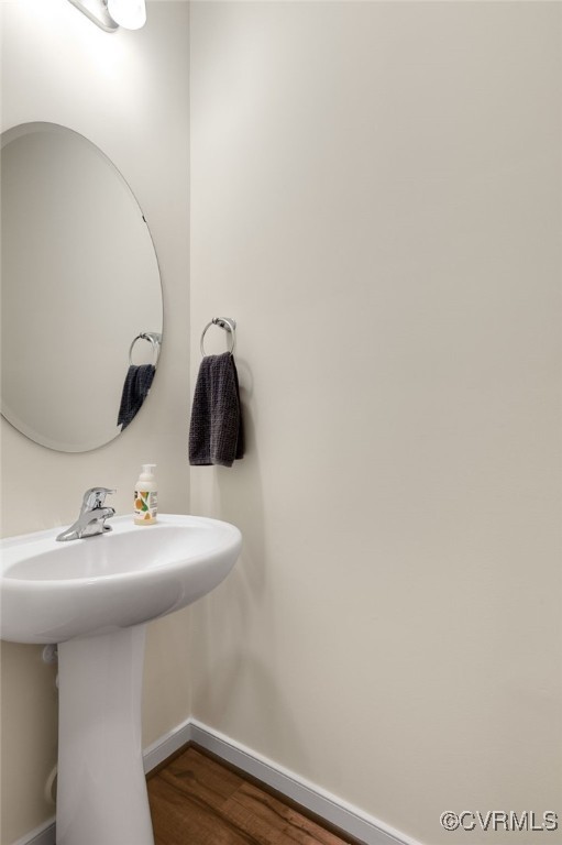 18325 Palisades Ct, Moseley, VA 23120 - bathroom featuring baseboards and wood finished floors