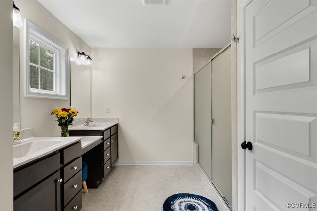 18325 Palisades Ct, Moseley, VA 23120 - full bathroom with a shower stall, two vanities, and tile patterned flooring