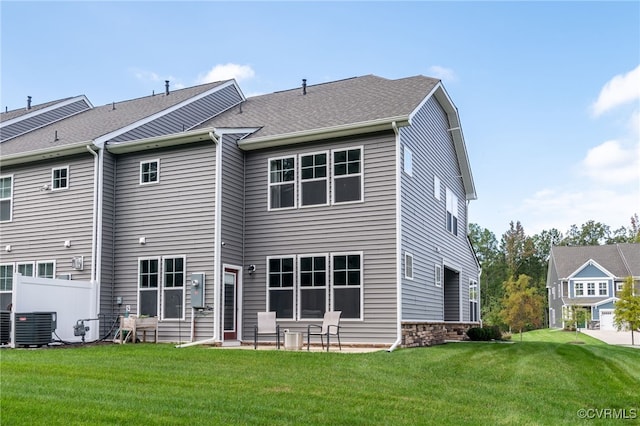 18325 Palisades Ct, Moseley, VA 23120 - rear view of house with a lawn and a patio