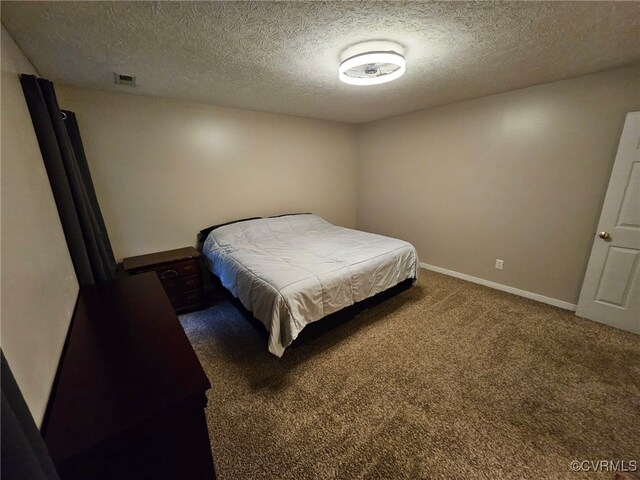 4740 Old Williamsburg Rd, Sandston, VA 23150 - bedroom featuring carpet flooring and a textured ceiling
