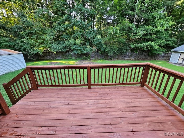 4740 Old Williamsburg Rd, Sandston, VA 23150 - deck featuring a fenced backyard and a storage unit