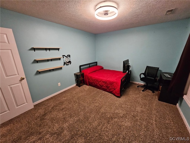 4740 Old Williamsburg Rd, Sandston, VA 23150 - carpeted bedroom featuring a textured ceiling and baseboards