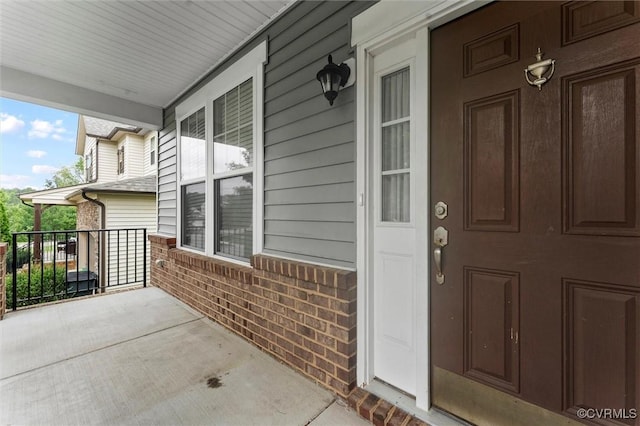 17412 Trevino Pkwy, Moseley, VA 23120 - view of exterior entry featuring covered porch and brick siding