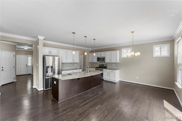 17412 Trevino Pkwy, Moseley, VA 23120 - kitchen featuring stainless steel appliances, an island with sink, a chandelier, backsplash, and dark wood-type flooring
