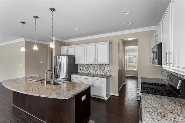17412 Trevino Pkwy, Moseley, VA 23120 - kitchen with appliances with stainless steel finishes, dark wood-style flooring, light stone countertops, decorative backsplash, and crown molding