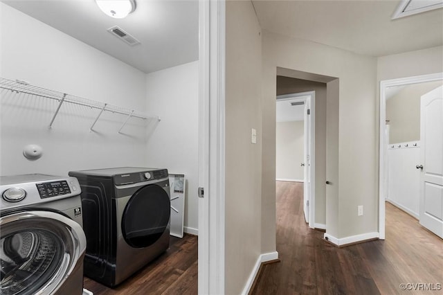 17412 Trevino Pkwy, Moseley, VA 23120 - washroom featuring washer and clothes dryer and wood finished floors