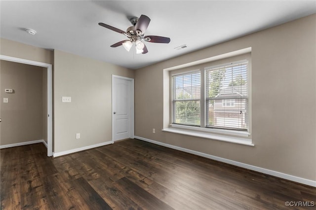 17412 Trevino Pkwy, Moseley, VA 23120 - spare room with dark wood-style flooring, a smoke detector, and ceiling fan