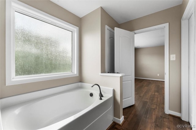 17412 Trevino Pkwy, Moseley, VA 23120 - bathroom with a garden tub and wood finished floors