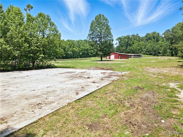 33419 Richmond Tpke, Hanover, VA 23069 - view of green lawn with an outdoor structure, a view of trees, and an outbuilding