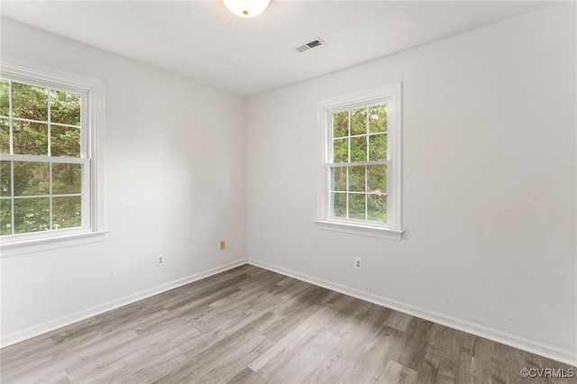 10500 Claybar Trl, North Chesterfield, VA 23236 - empty room featuring plenty of natural light and wood finished floors