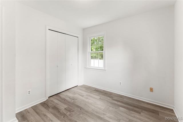 10500 Claybar Trl, North Chesterfield, VA 23236 - unfurnished bedroom with wood finished floors and a closet