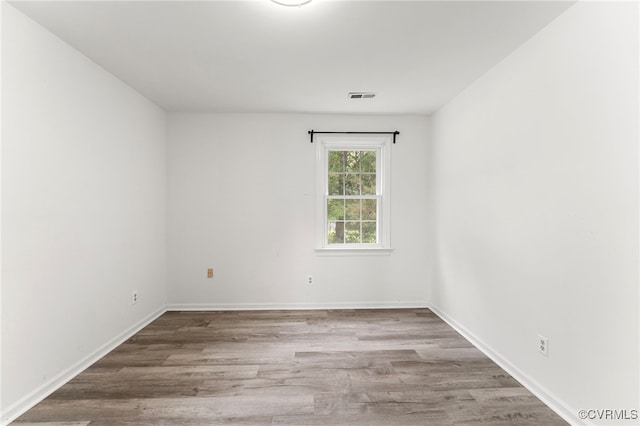 10500 Claybar Trl, North Chesterfield, VA 23236 - spare room featuring wood finished floors and baseboards
