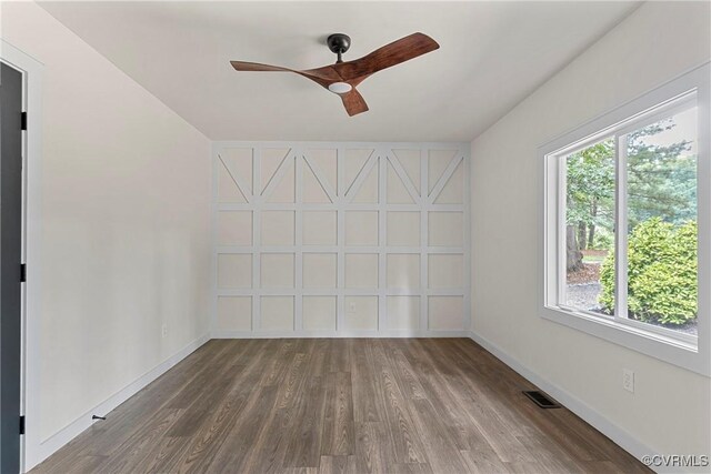 113 Rappa Run Rd, Topping, VA 23169 - unfurnished room with a ceiling fan and dark wood-style floors