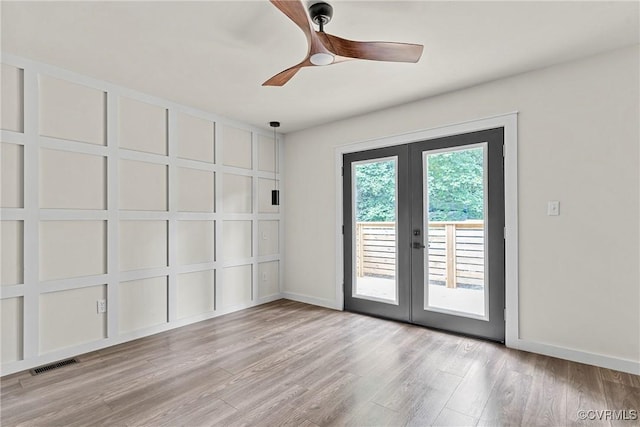113 Rappa Run Rd, Topping, VA 23169 - unfurnished room with french doors, wood finished floors, and ceiling fan