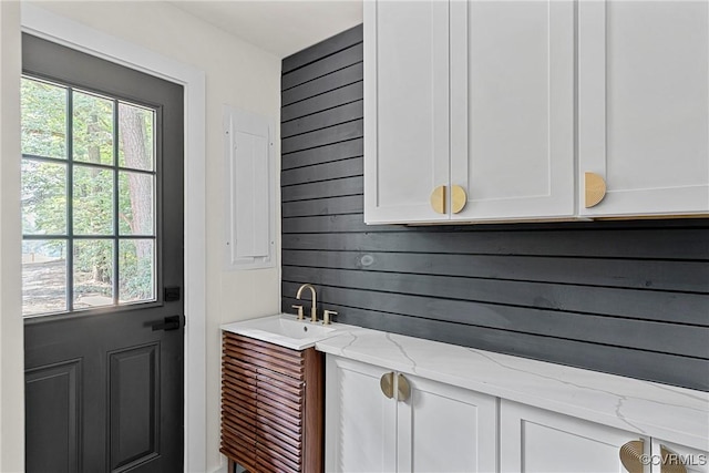 113 Rappa Run Rd, Topping, VA 23169 - bar with wood walls and healthy amount of natural light