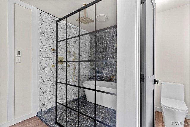 113 Rappa Run Rd, Topping, VA 23169 - full bath with a freestanding bath, wood finished floors, and tiled shower