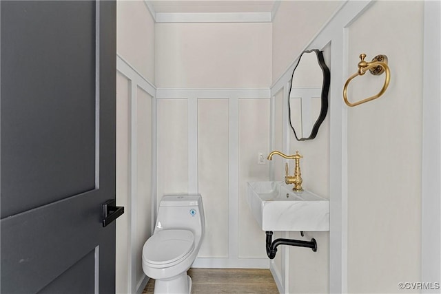 113 Rappa Run Rd, Topping, VA 23169 - half bath with toilet and wood finished floors