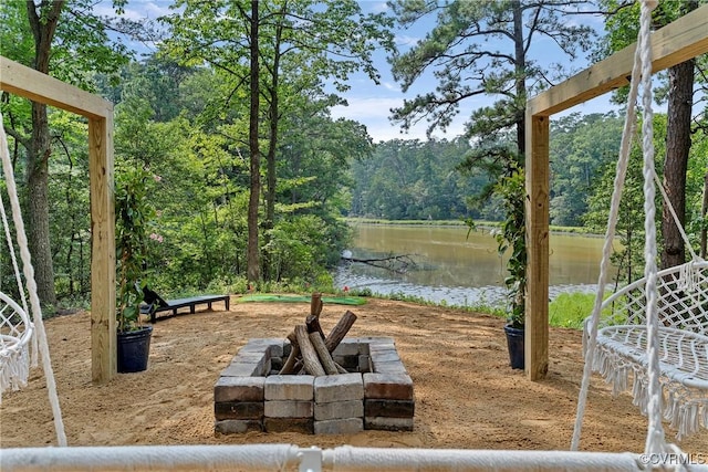 113 Rappa Run Rd, Topping, VA 23169 - view of patio / terrace featuring an outdoor fire pit, a water view, and a forest view