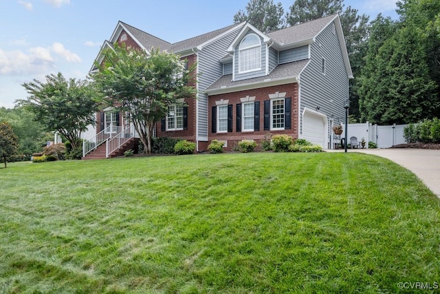 15585 Fox Cove Cir, Moseley, VA 23120 - view of front of property featuring concrete driveway, a gate, brick siding, and roof with shingles