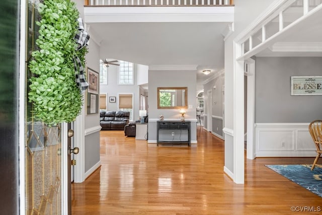 15585 Fox Cove Cir, Moseley, VA 23120 - entrance foyer with ornamental molding, light wood-type flooring, and a ceiling fan