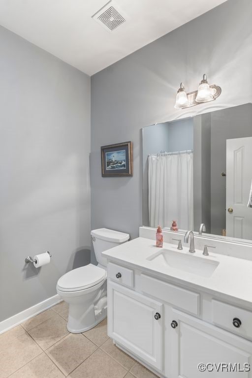 15585 Fox Cove Cir, Moseley, VA 23120 - bathroom featuring tile patterned flooring and vanity
