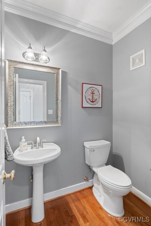 15585 Fox Cove Cir, Moseley, VA 23120 - half bath with crown molding and wood finished floors