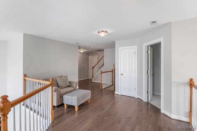 15585 Fox Cove Cir, Moseley, VA 23120 - sitting room with wood finished floors and an upstairs landing