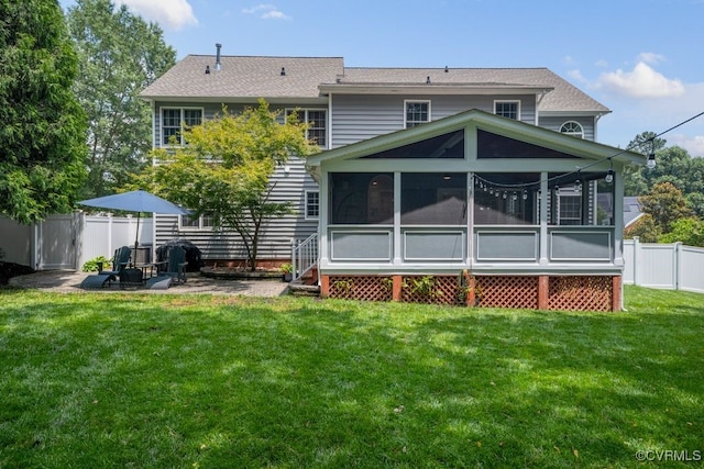 15585 Fox Cove Cir, Moseley, VA 23120 - back of property with a sunroom, a fenced backyard, a patio area, and roof with shingles