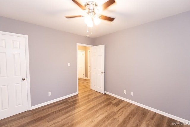 64 Gibbons Ave, Petersburg, VA 23803 - unfurnished bedroom featuring wood finished floors and ceiling fan