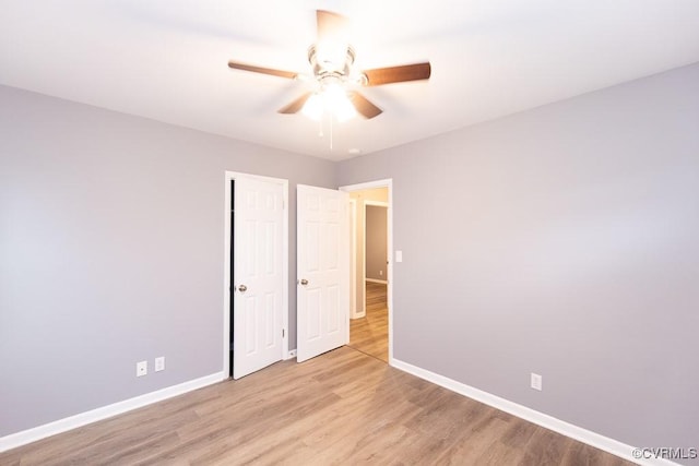 64 Gibbons Ave, Petersburg, VA 23803 - unfurnished bedroom with light wood-style floors and ceiling fan