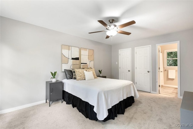 1712 Porters Mill Ln, Midlothian, VA 23114 - bedroom with light colored carpet, a ceiling fan, and ensuite bath