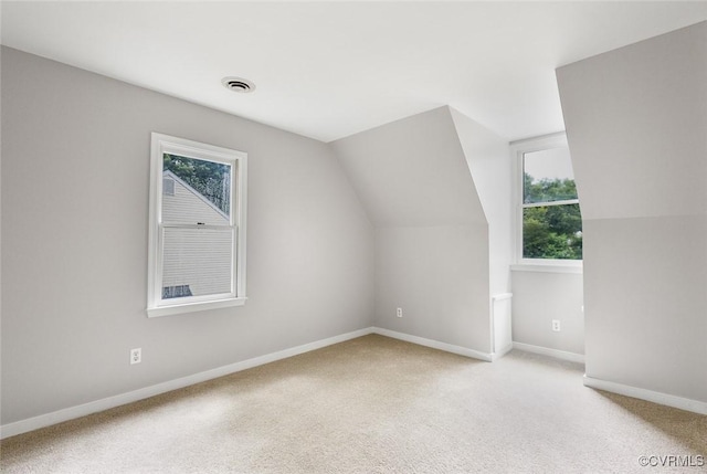 1712 Porters Mill Ln, Midlothian, VA 23114 - bonus room with healthy amount of natural light, light colored carpet, and vaulted ceiling
