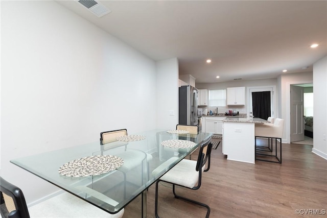 6740 Edith Oaks Way Unit 6740, Chesterfield, VA 23234 - dining space with wood finished floors and recessed lighting