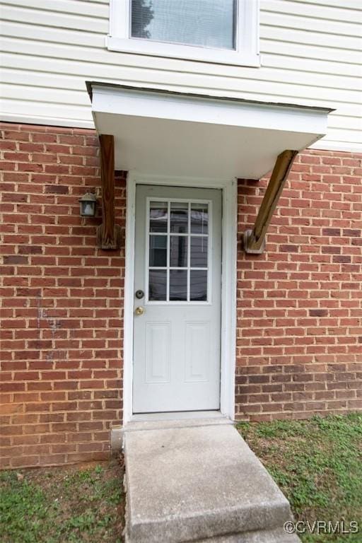 407 E 2nd St, Farmville, VA 23901 - view of exterior entry with brick siding