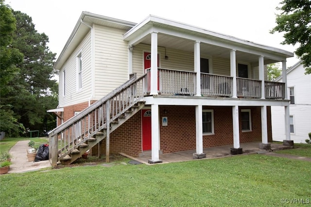 407 E 2nd St, Farmville, VA 23901 - view of front of property featuring a front lawn, stairs, and covered porch
