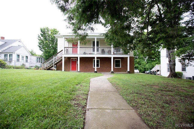 407 E 2nd St, Farmville, VA 23901 - view of front of property featuring stairway, a front lawn, and covered porch