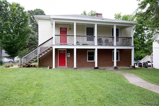 407 E 2nd St, Farmville, VA 23901 - view of front of property featuring stairs, a chimney, a front lawn, a porch, and brick siding