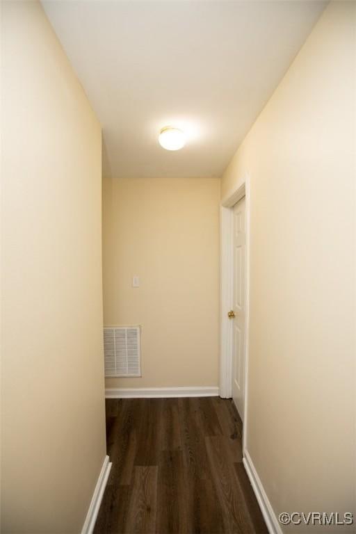 407 E 2nd St, Farmville, VA 23901 - hall with dark wood-style flooring and baseboards