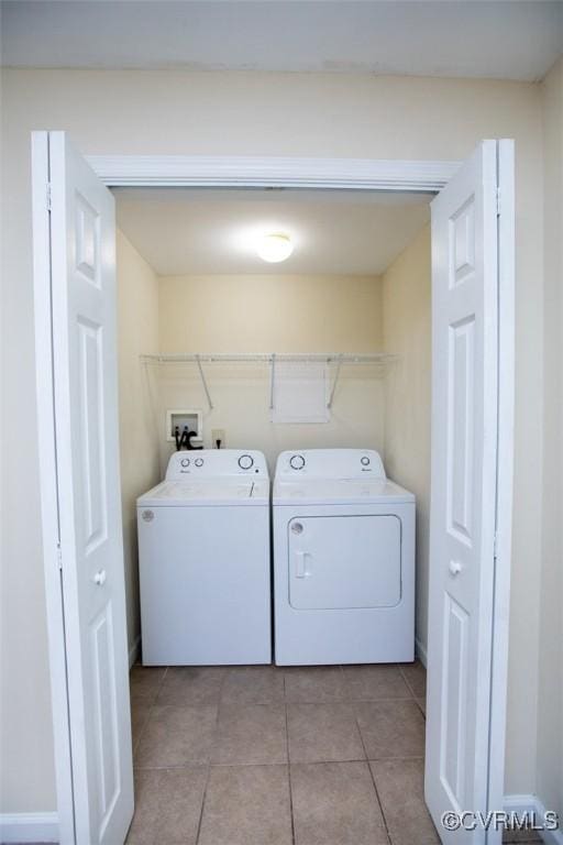 407 E 2nd St, Farmville, VA 23901 - laundry area featuring washer and clothes dryer and light tile patterned flooring