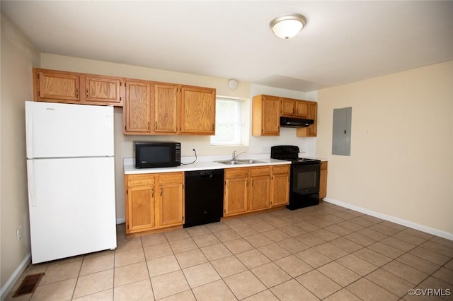 407 E 2nd St, Farmville, VA 23901 - kitchen with black appliances, electric panel, under cabinet range hood, and light countertops
