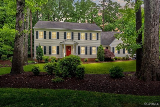 5911 Waters Edge Rd, Midlothian, VA 23112 - colonial house featuring a chimney and a front yard