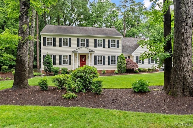 5911 Waters Edge Rd, Midlothian, VA 23112 - colonial home featuring a front lawn and roof with shingles