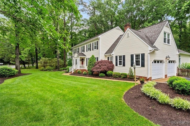 5911 Waters Edge Rd, Midlothian, VA 23112 - colonial-style house with a chimney, a shingled roof, a front lawn, and a garage
