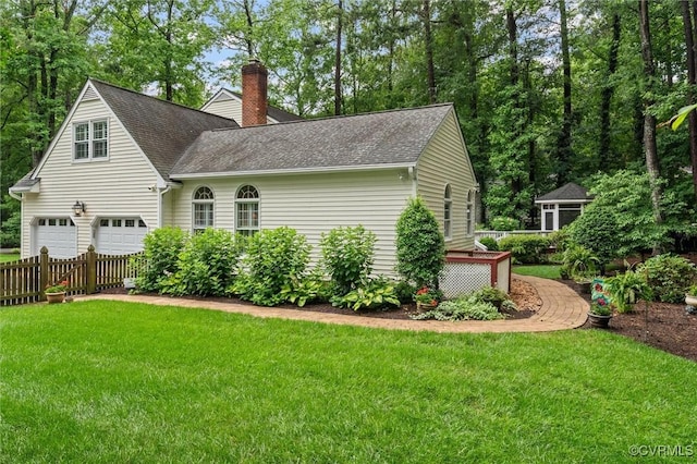 5911 Waters Edge Rd, Midlothian, VA 23112 - view of side of property with a chimney, roof with shingles, and an attached garage