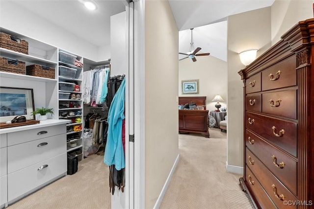 5911 Waters Edge Rd, Midlothian, VA 23112 - spacious closet with light colored carpet, ceiling fan, and vaulted ceiling