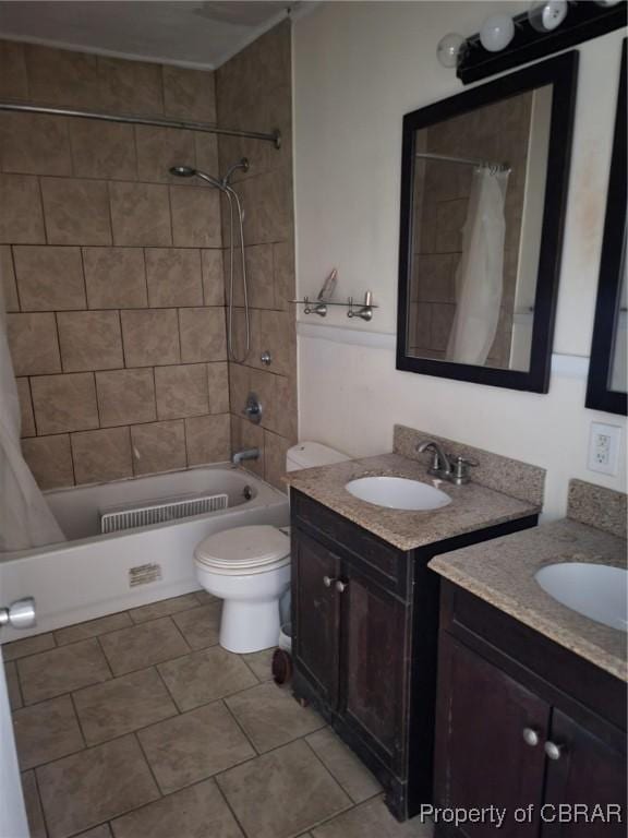 527 Price St, Hampton, VA 23663 - full bathroom with two vanities, shower / bath combo, and tile patterned floors