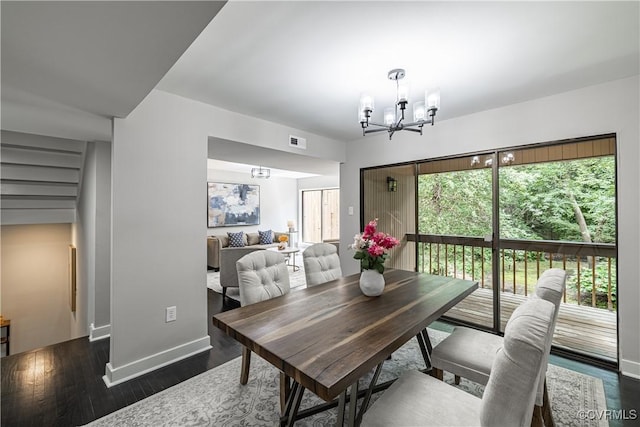 9312 Groundhog, Chesterfield, VA 23235 - dining room with a chandelier and dark wood-style flooring