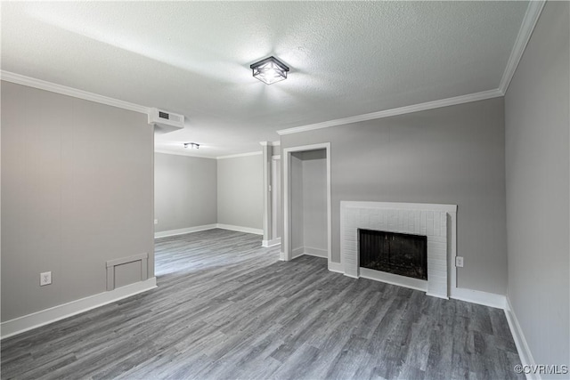9312 Groundhog, Chesterfield, VA 23235 - unfurnished living room with crown molding, dark wood-type flooring, a textured ceiling, and a fireplace