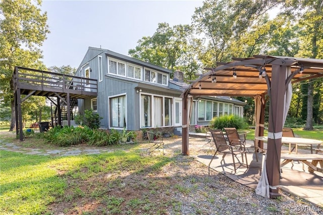 17009 Faithful Run, Montpelier, VA 23192 - back of property with stairway, a wooden deck, a patio area, and a pergola
