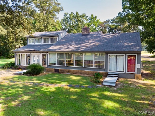 17009 Faithful Run, Montpelier, VA 23192 - view of front facade with a chimney, a front yard, and roof with shingles